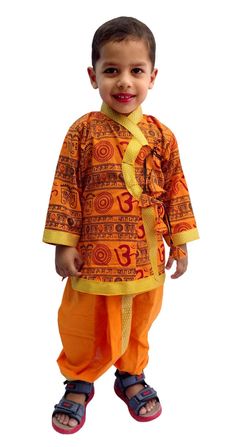 "This traditional Indian \"Famous Saffron OM Print cotton Angrakha & Dhoti will surely add charm to your cute boy. SALES PACKAGE- 1 Kurta, 1 Dhoti FABRIC- 100%cotton OTHER DETAILS- This Product Is Good For Your Baby Skin                                    Best Quality And Quick Dispatch                                    It has a soft elastic belt for convenient fitting on the waist. Delivery time ranges between 11 - 18 working days, we provide a Express Shipping Also 5-7 days with Extra charge. You may choose in shipping Option. * You May Conversation With Me if You have any doubt. Thank you so much to visit my shop. Rajesh Bansal owner of Rajasthani Dresses" Traditional Dress For Boy, Rajasthani Dress, Dress Handmade, Elastic Belt, Ethnic Dress, Clothing Sets, Baby Skin, Guys And Girls, Baby Wearing