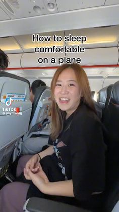 a woman sitting in an airplane with the words how to sleep comfortable on a plane