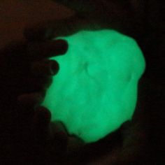 a person holding a glowing object in their hand