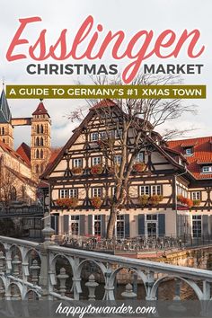 an old building with the words esslingen christmas market on it and a bridge in front