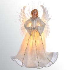 an angel ornament hanging from the ceiling with lights on it's wings