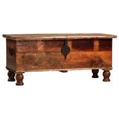 an old wooden chest with two drawers on one side and a door at the top