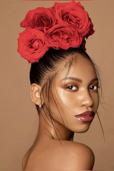 a woman with red roses on her head and hair in the middle of her face