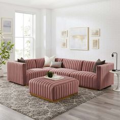 a living room filled with furniture and a rug