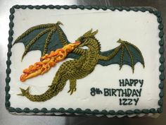 a birthday cake with a dragon on it