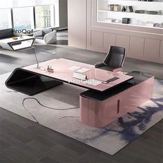 an office desk with black and pink furniture in the middle of a living room area