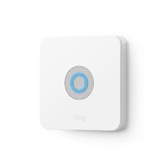 the ring appliance is mounted on top of a white wall with blue circles