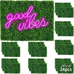 the words good vibes are written in pink neon letters on top of green grass