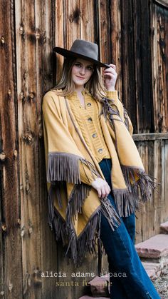 Winter Cape With Tassels, Winter Fringe Cape Outerwear, Fringe Shawl Outerwear For Fall, Fall Fringe Cape Outerwear, Fringe Cape Outerwear For Fall, Fall Shawl Cape With Fringe, Fringe Shawl Cape For Fall, Bohemian Cape With Tassels For Fall, Spring Fringe Shawl Outerwear