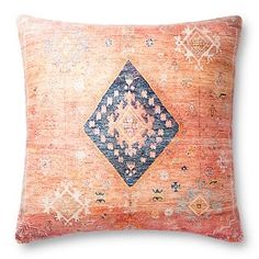 an orange and blue decorative pillow on a white background with geometric designs in the middle