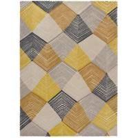 a yellow and grey rug with squares on it