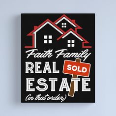 a real estate sold sign in front of a house canvas print