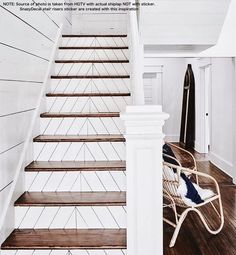 the stairs in this house are white and wood