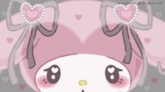 a pink and gray rabbit with hearts on it's ears