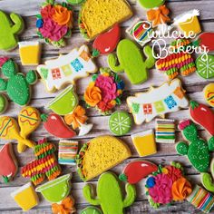 some decorated cookies are sitting on a table