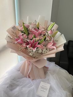 a bouquet of flowers sitting on top of a table