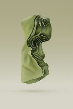 a folded green piece of paper with wavy folds