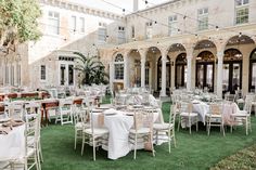 tables and chairs are set up outside for an event