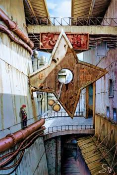 a painting of a star hanging from the side of a building