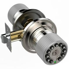 an electronic door lock with keys on the front and back buttons are shown in this image