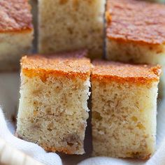 several pieces of cake sitting on top of a white paper towel next to each other