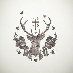 a drawing of a deer with a cross on it's antlers and flowers