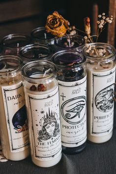 several candles are lined up on a table