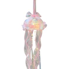 a pink and white lamp hanging from a ceiling in the shape of a jellyfish