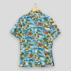 Vintage 90s Hawaiian Coconut Tree Beach View Cotton Shirt Large Honolulu Usa Hawaii Ocean Vacation Shirt Surf Aloha Buttondown Shirt Size L Good Used Condition. No Stains and No Holes Size (On Tag) : Size L **To make sure if it FITS YOU, refer at the exact measurements. Size Measurement (All measurements were taken lying flat) : Width [armpit to armpit] : 23 inches / 58 cm Length [shoulder to end of garment] : 29 inches / 74 cm THIS IS USED CLOTHING! PLEASE DON`T EXPECTED IT TO BE LIKE NEW OR DO Printed Button-up Beach Shirt, Summer Short Sleeve Shirt With Button Closure For Beach, Beach Hawaiian Shirt With Button Closure, Summer Beach Hawaiian Shirt With Button Closure, Summer Button-up Hawaiian Shirt For Beach, Hawaiian Shirt With Button Closure For Beach, Summer Hawaiian Button-up Shirt For Beach, Beach Shirt With Camp Collar, Beach Shirt With Camp Collar And Button Closure