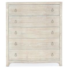 the chest of drawers is made from wood and has four drawers, one with three knobs on each side