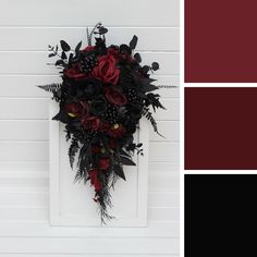 a red and black wedding bouquet on a white door with matching color swatches in the background