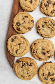 chocolate chip cookies arranged on a cutting board