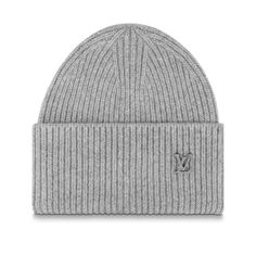 The lv beanie is reimagined in a wide palette of punchy bright hues. This wintery weather staple is crafted from pure cashmere and has an allover ribbed knit for tactile appeal. An easy to wear style, it is finished with enamel tone-on-tone lv initials that sit elegantly on the turned-up cuff. Chanel Beanie, Lv Beanie, Sit Elegantly, Louis Vuitton Mens Bag, Winter Beanies, Mode Zara, Best Travel Accessories, Fake Jewelry, Grey Beanie