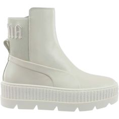 PRICES MAY VARY. sku=36626602-5.5 Part of the Puma x Fenty Rihanna Collection, the Chelsea Sneaker Boot is a sylish model with quality construction. They are crafted with a leather upper, feature elastic goring, heel pull tab, extra tall stacked sole, and come packaged with a Fenty dust bag. Fenty Boots, Rain Boot Outfit, Puma X Fenty, Puma Fenty, Creepers Shoes, Ankle Rain Boots, Frye Boots, Cute Boots, Puma X