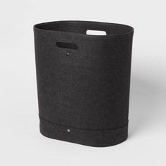 a black trash can on a white background