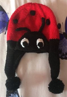 Hand Knitted In Acrylic yarn, Ladybird/Ladybug hat for Baby/Child/Teen/Adult  Great fun hat with lovely features.  Brighten your head in the Autumn/winter or when it's cold. Ladybug Hat, Hat For Baby, Fun Hat, Cool Hats, It's Cold, Baby Hats, Acrylic Yarn, Hand Knitting, Caps Hats