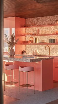 an orange kitchen with pink counter tops and stools