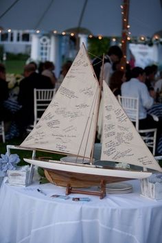 a small sailboat is sitting on a table