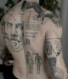 a man with many tattoos on his back