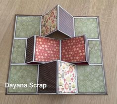 a close up of a tile design on a wooden floor with the words dayana scrap written below it