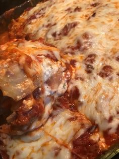 a casserole dish with meat and cheese on it, ready to be eaten