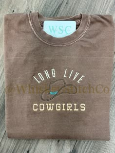 "Comfort Colors T-shirt \"Long Live Cowgirls\" All Specs and material info is listed on the spec sheet, in the images section. All colors are typically available, Please message me if your desired color is not listed! **Also Available in LONG SLEEVES Embroidery get creased [not permanently] in the wash/dry process. For longest life, please follow these instructions! 💧 Machine wash cold, inside-out, gentle cycle with mild detergent and similar colors. Consider using a garment bag** Remove prompt Long Live Cowgirls Shirt, Embroidery Designs Shirts, Country Shirts For Women, Western Shirt Ideas, Country T Shirts, Western Tshirts, Western Shirts For Women, Sleeves Embroidery, Cowgirl Shirts