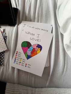 a card that says, i have you more what i love? with pictures of people in the heart