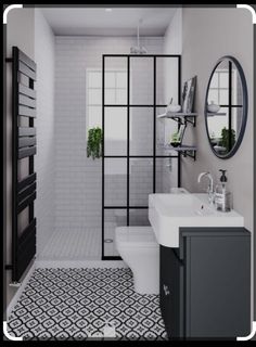 a bathroom with black and white tiles on the floor