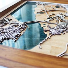 a wooden cutout of a city map