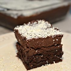 two pieces of chocolate cake on a plate