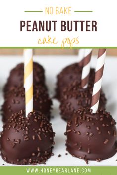 chocolate covered cake pops on a white plate with two striped straws in the middle