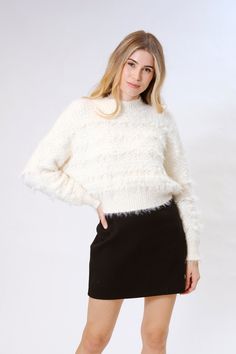 Cozy up in style with our Mock Neck Long Sleeve Sweater featuring a touch of glamour with faux fur fringe. Embrace the warmth of this chic and on-trend sweater, designed to elevate your winter wardrobe. The mock neck provides an extra layer of comfort, while the long sleeves keep you snug. What sets this sweater apart is the faux fur fringe detail, adding a playful and luxurious touch to your look. Whether you're heading out for a casual day or dressing up for a night out, this sweater effortles Sweater Trends, Mock Neck Long Sleeve, Winter Wardrobe, Sleeve Sweater, Long Sleeve Sweater, Mock Neck, Sweaters & Cardigans, Fashion Forward, Faux Fur