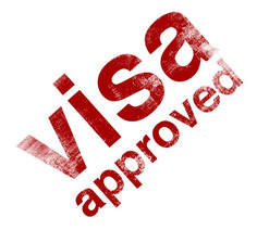 visa approved stamp with the words visa approved written in red on a white paper background