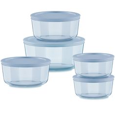 four clear plastic containers with lids